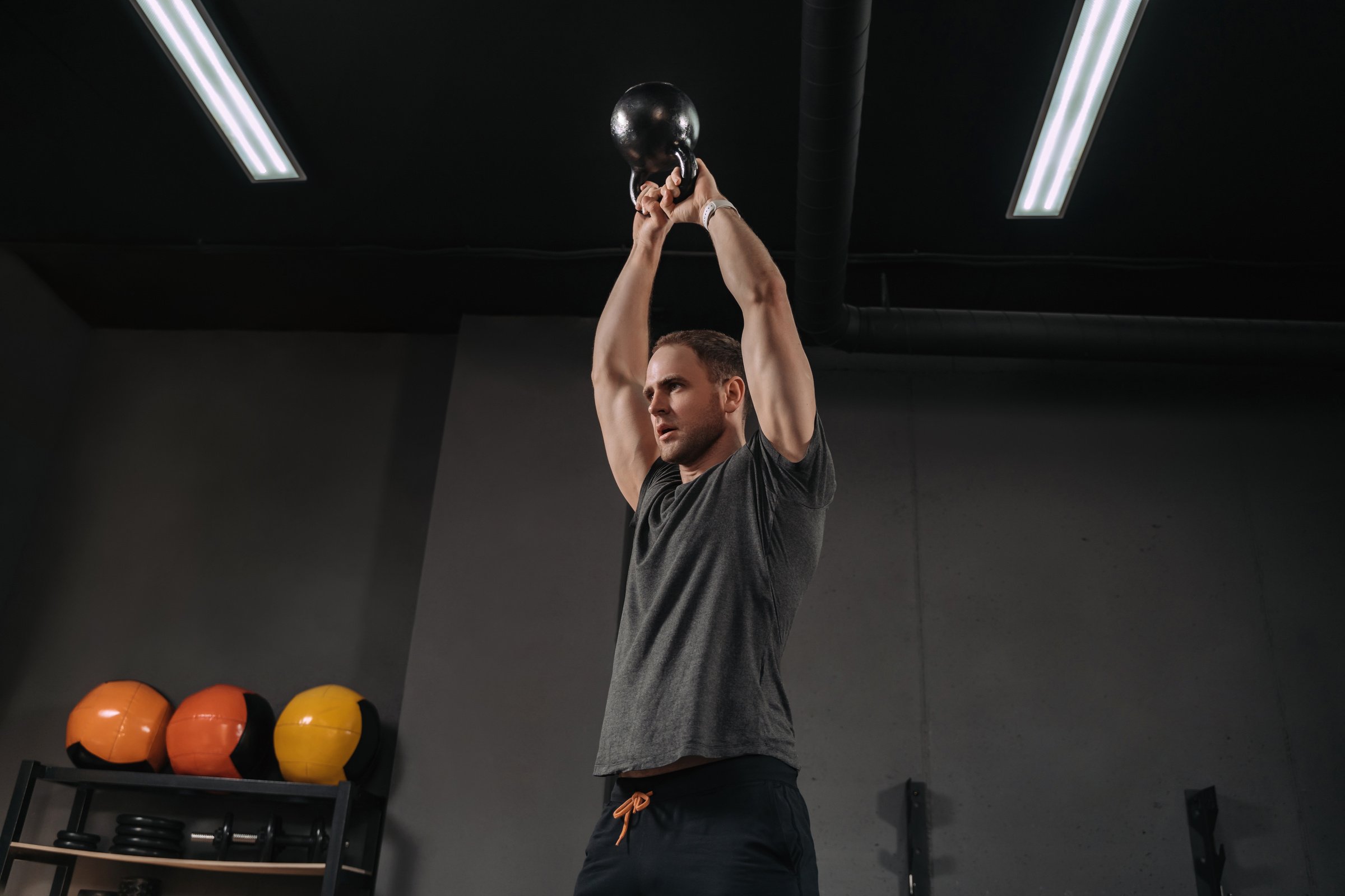 Man having functional training with kettlebell